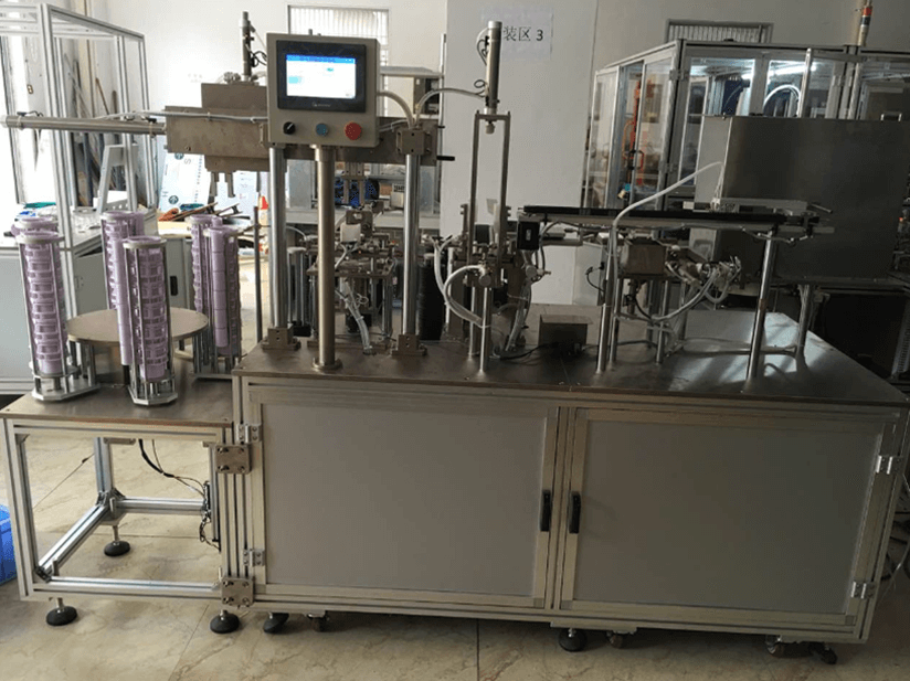 Automatic assembling machine for drain valve base